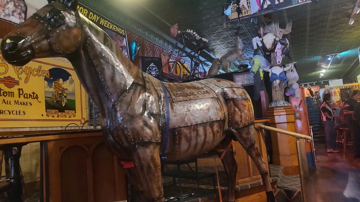 The large handcrafted riveted metal horse inside Iron Horse Social Club